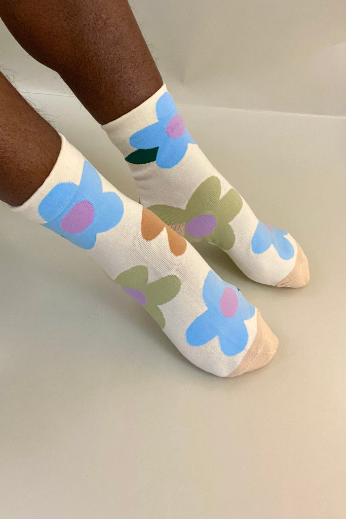 Cream daisy crew socks with pastel blue and green flowers – soft floral socks for everyday wear