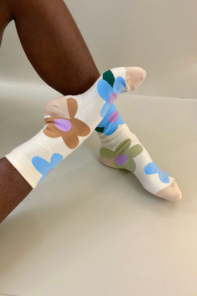 Colorful flower print socks on a cream base – cozy crew-length socks with abstract daisy design for women