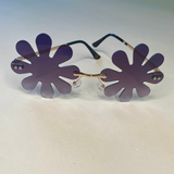 black flower shaped sunglasses with gold arms -retro daisy petal shades