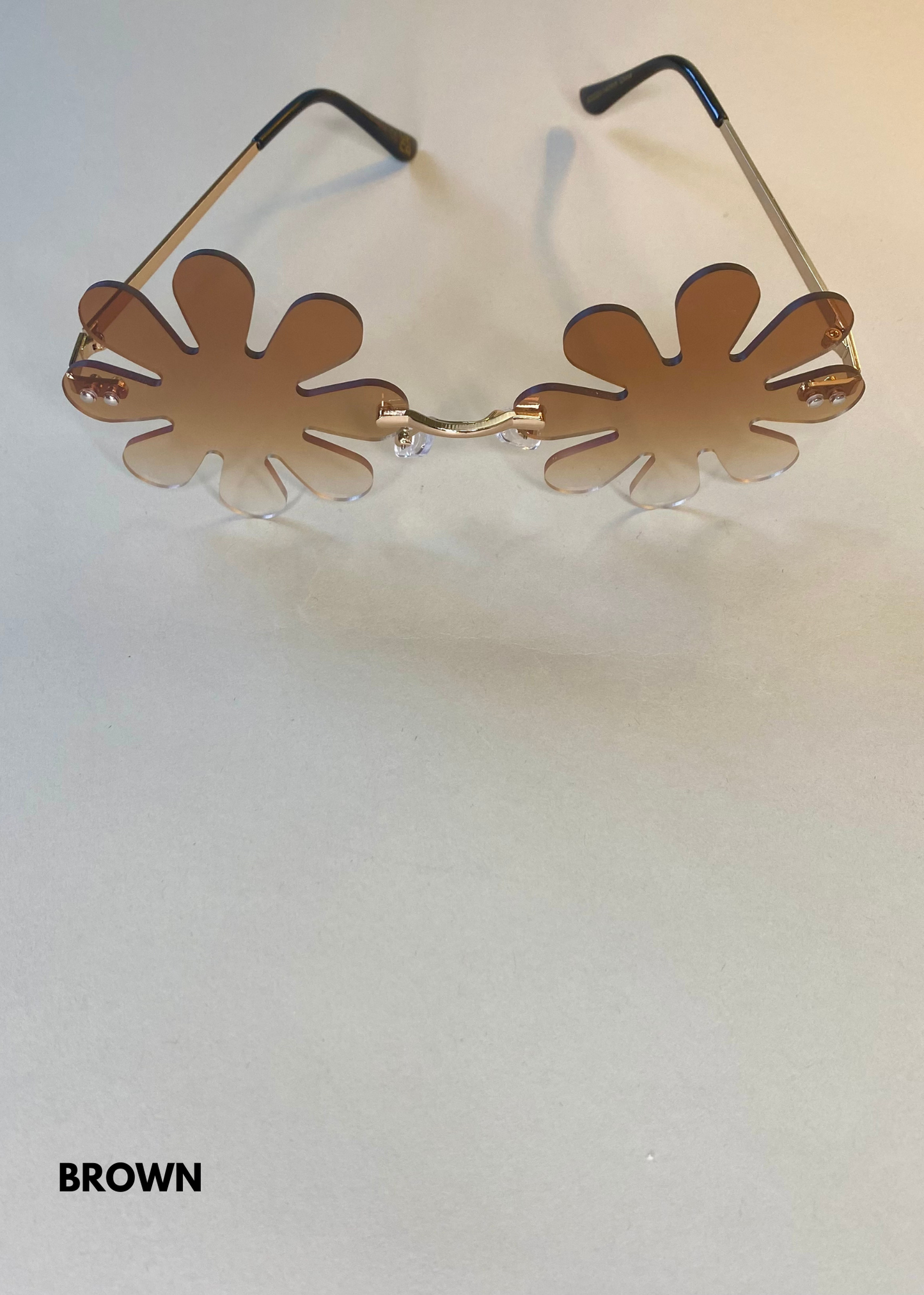 brown daisy shaped sunglasses with old hardware -vintage inspired lenses for stylish everyday weaar