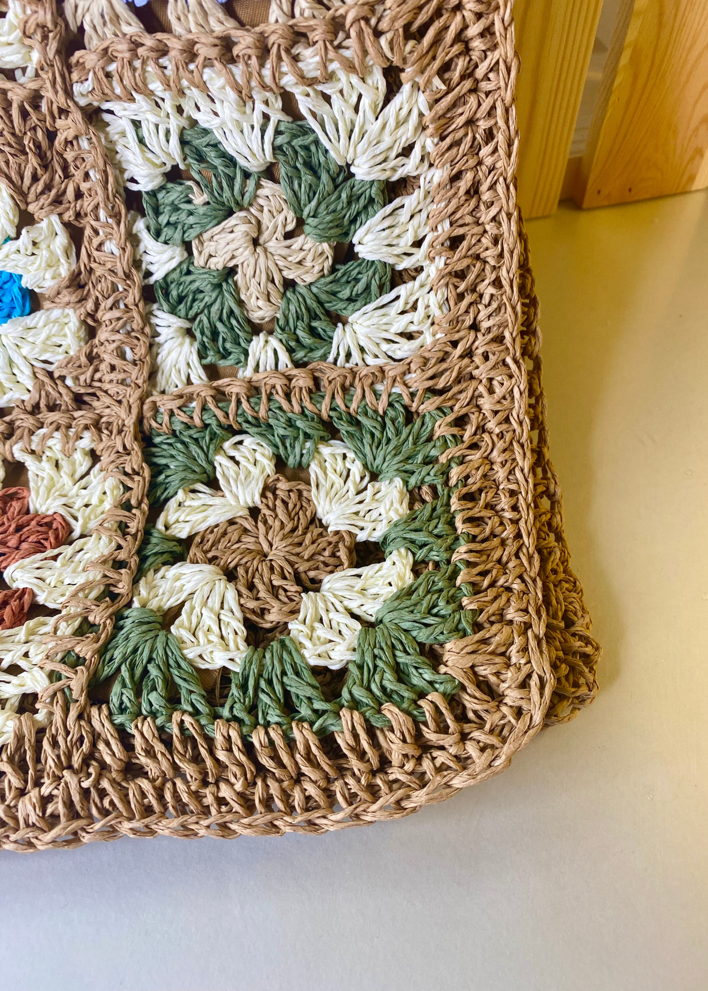 khaki colored lower square tote