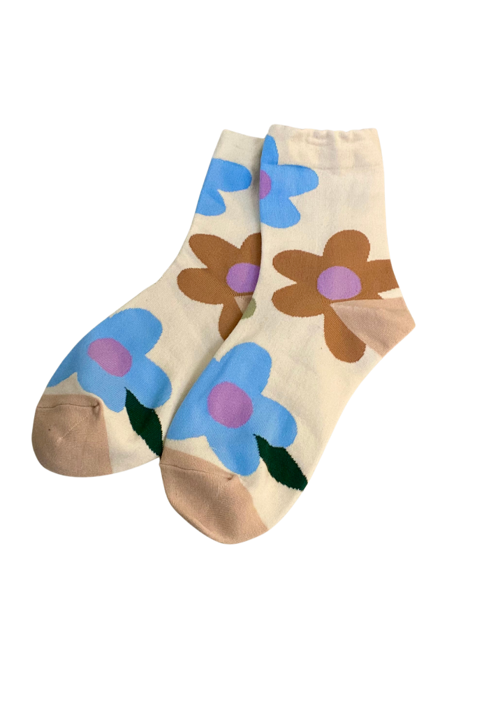 woman's patterned colorful daisy aesthetic socks 