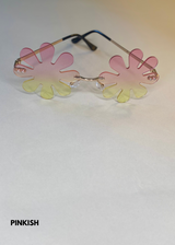 pink gradient splat sunglasses in a daisy flower shape - stylish rimless sunnies with playful petal design and gold temples