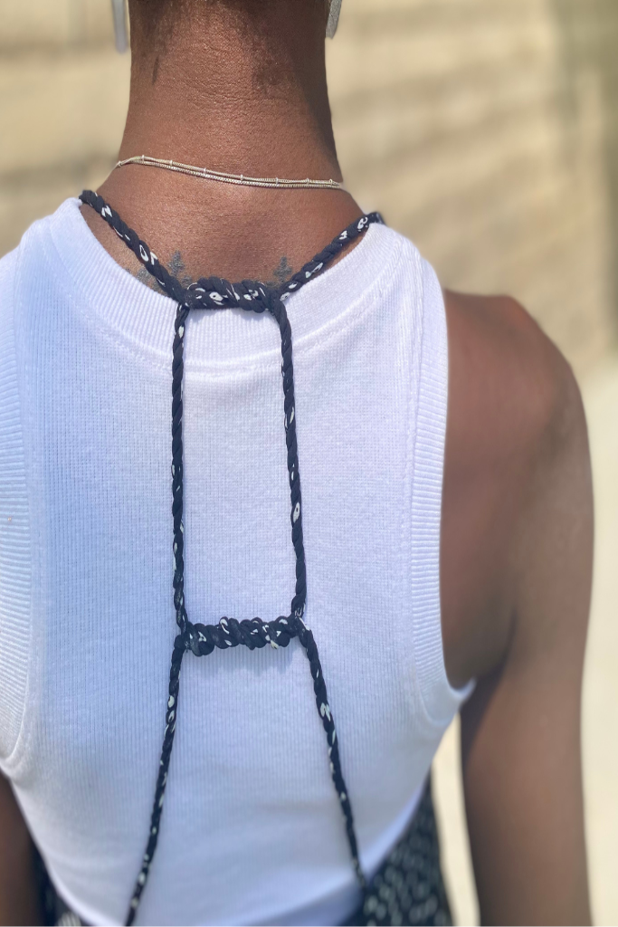 black spring or summer mini dress with twisted spaghetti straps